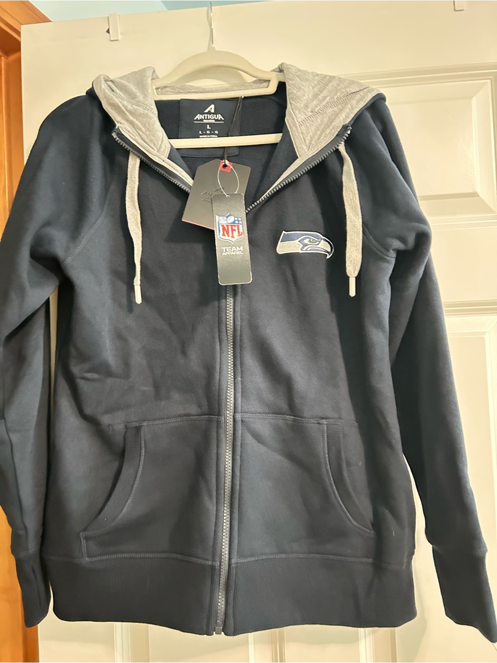Antigua Women’s Navy Zip-Up Hooded Jacket with Gray Lining - size Large